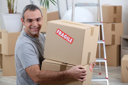 Professional packers handling items in Storage Putney