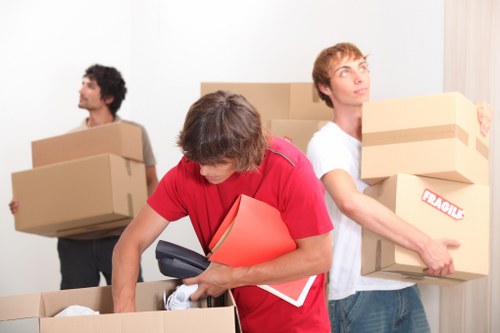 Professional movers assisting with a home move in Putney
