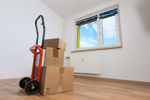 Removalists loading furniture into a moving truck