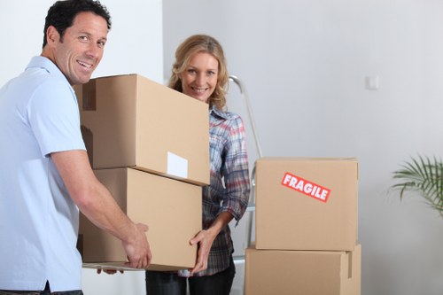 Office movers handling sensitive equipment
